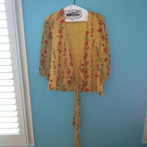 Yellow floral Wrap Blouse from Francesca’s